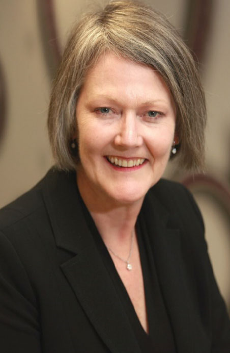 Head and shoulders of Professor Sue Thomas, Chief Executive Officer, wearing a black jacket.