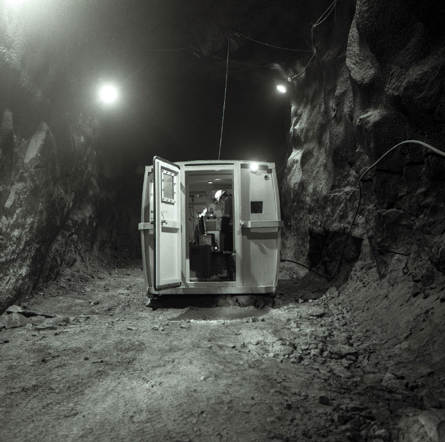 Black and white photograph of mobile laboratory within the Stawell Gold Mine. 