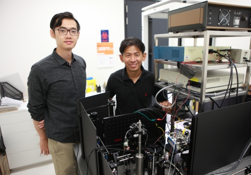 Dr Steve Lee, from The Australian National University  Research School of Engineering, with the microscope