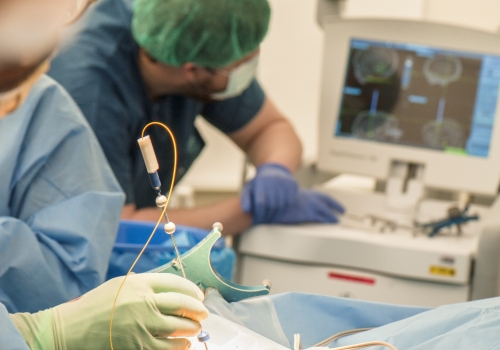 Team members testing the smart needle in surgery. 