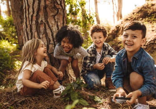 Kids playing in forest 